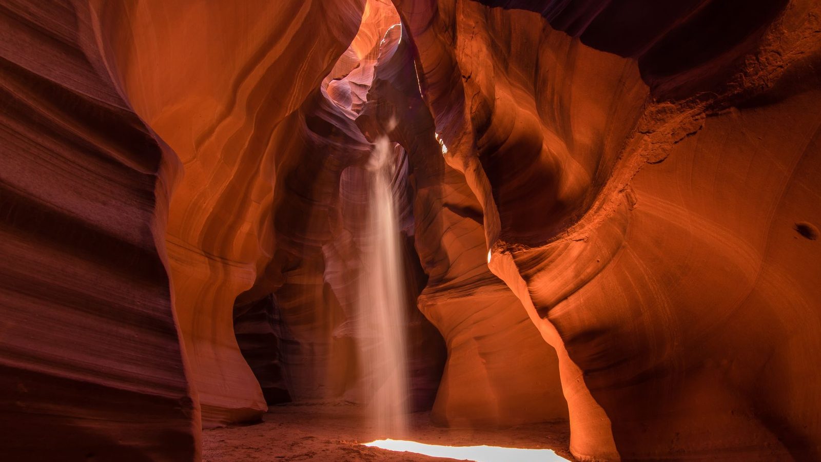 A beam of sunlight falling into Upper Antelope Canyon