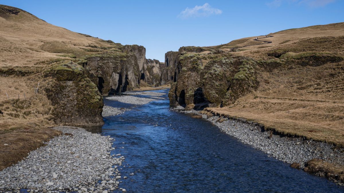 Clear blue light over the river in the canyon