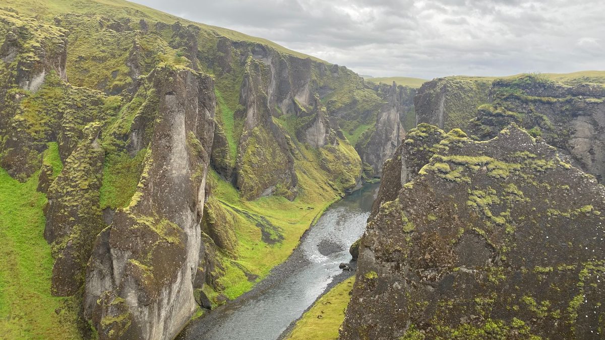 Moss-covered canyon walls and the river below