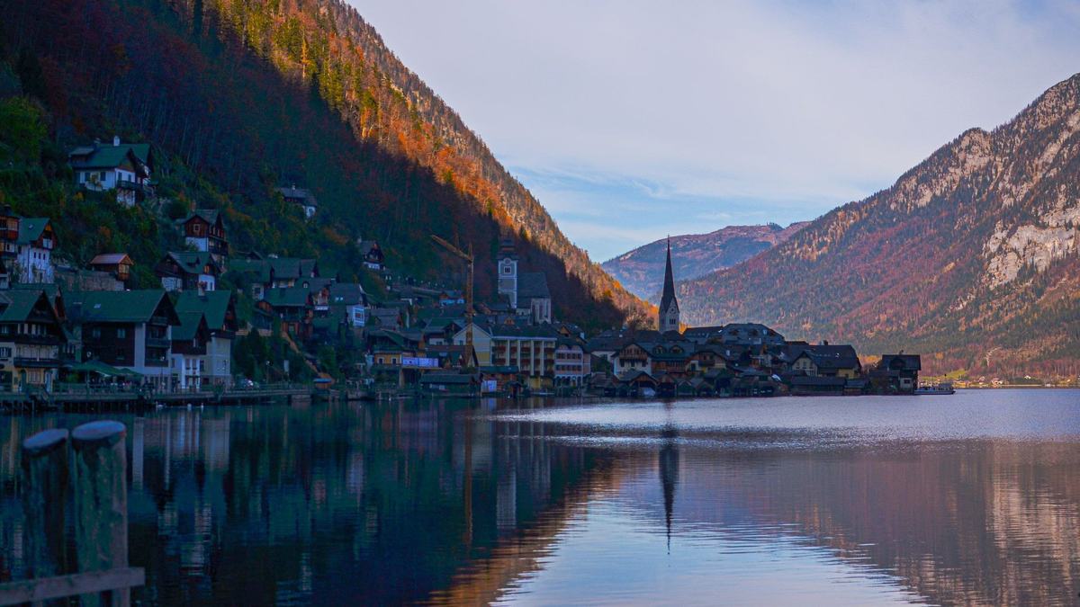 Hallstatt reflected in the lake in autumn