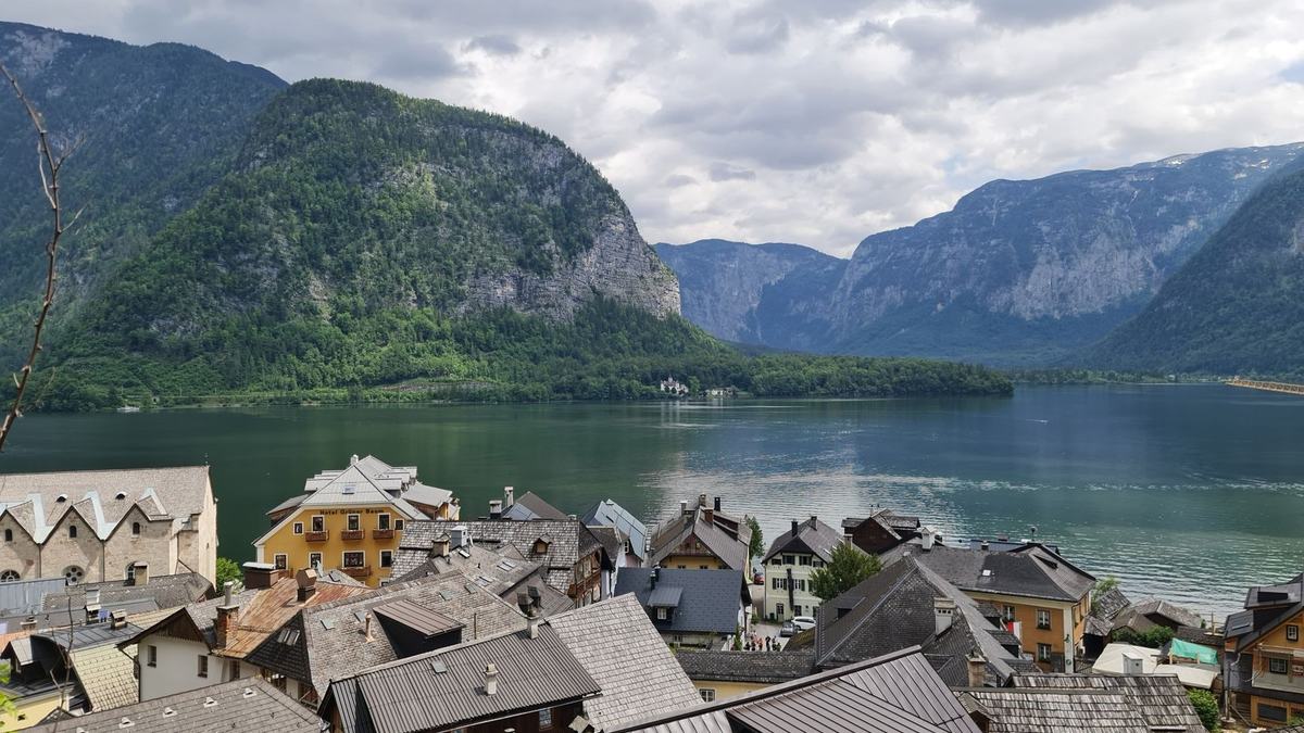 Aerial view of Hallstatt rooftops, the lake and mountains