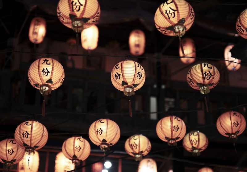 Rows of paper lanterns at night