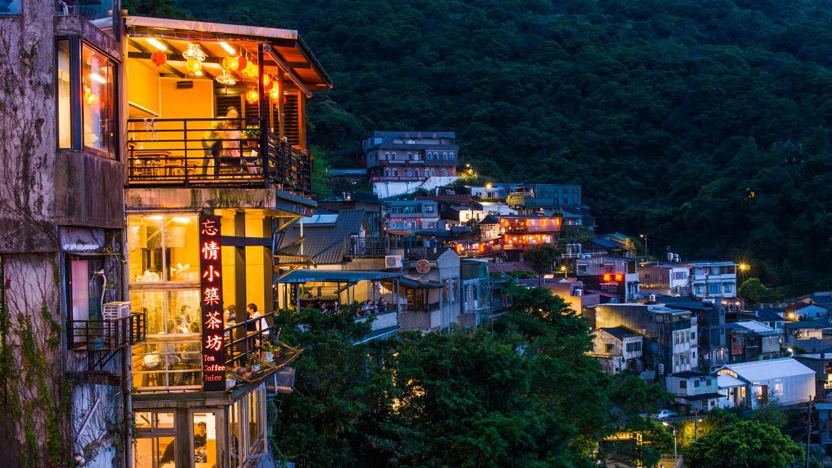 The town lit up at dusk
