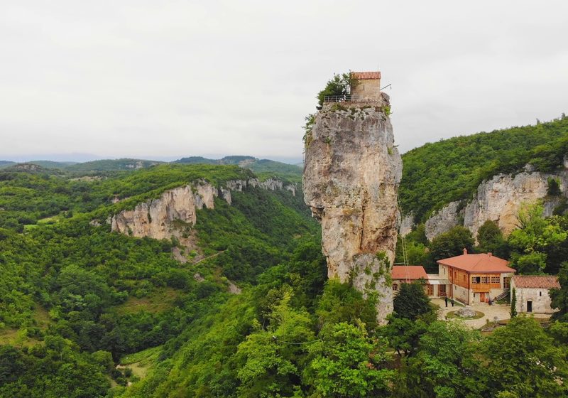 The pillar rising above a forest valley