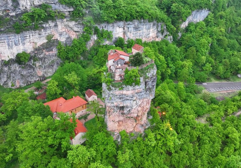 The pillar and the buildings at its base seen from above