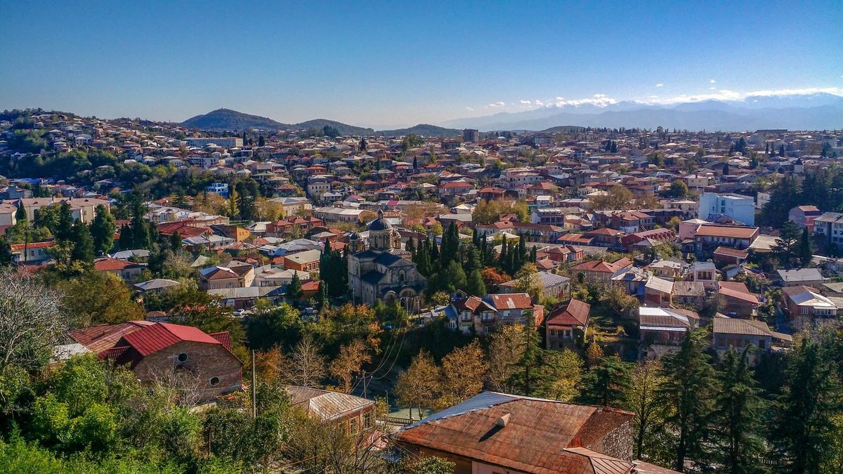 Rooftops of Kutaisi under a blue sky