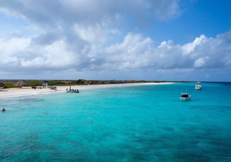 Turquoise water off a long beach on Klein Curaçao