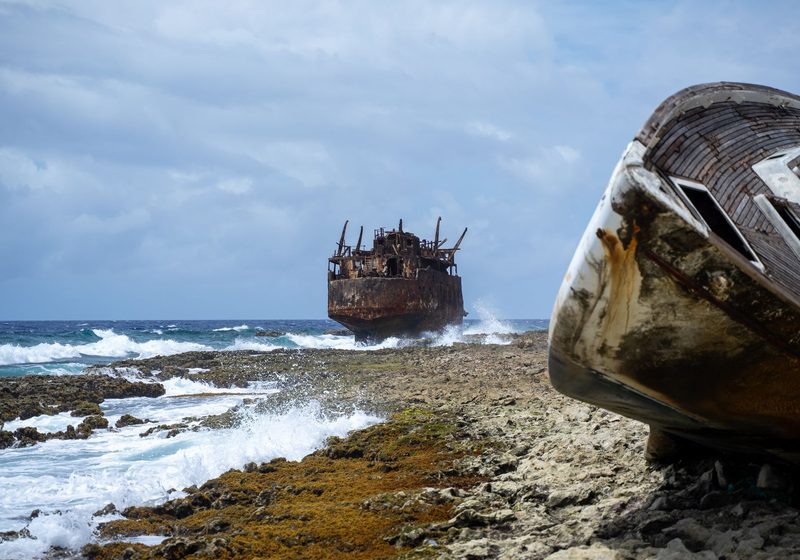 Rusting wrecks on the rocky shore