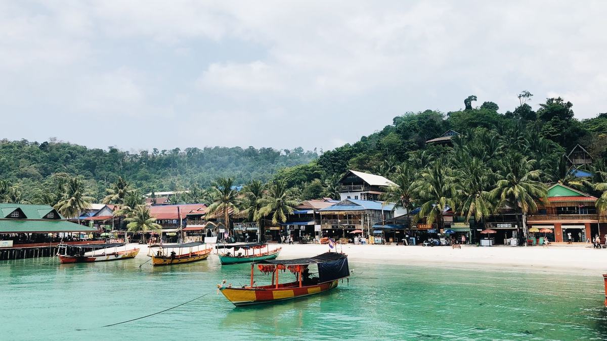 Boats moored off a beach in Sihanoukville, Cambodia
