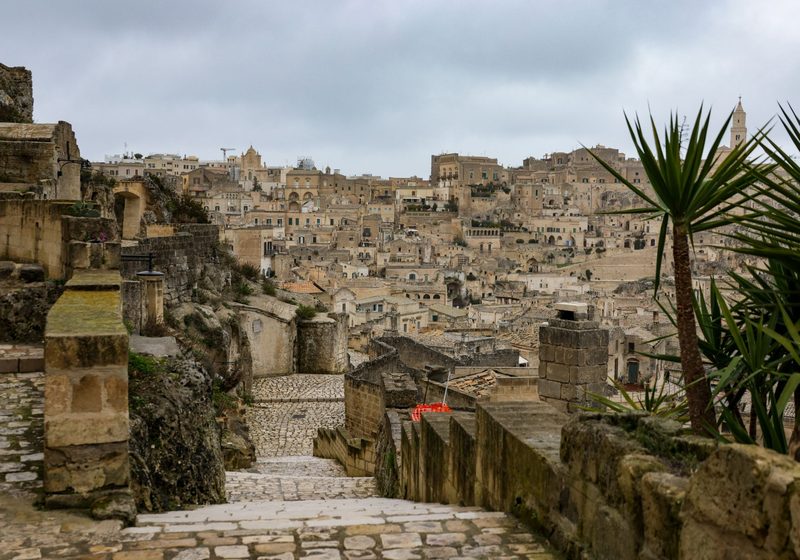 A stone stairway between old houses
