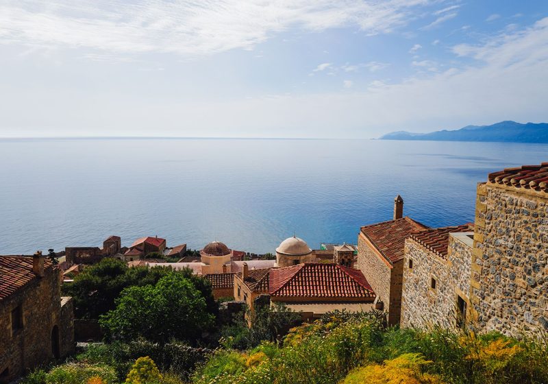 Terracotta rooftops above the sea