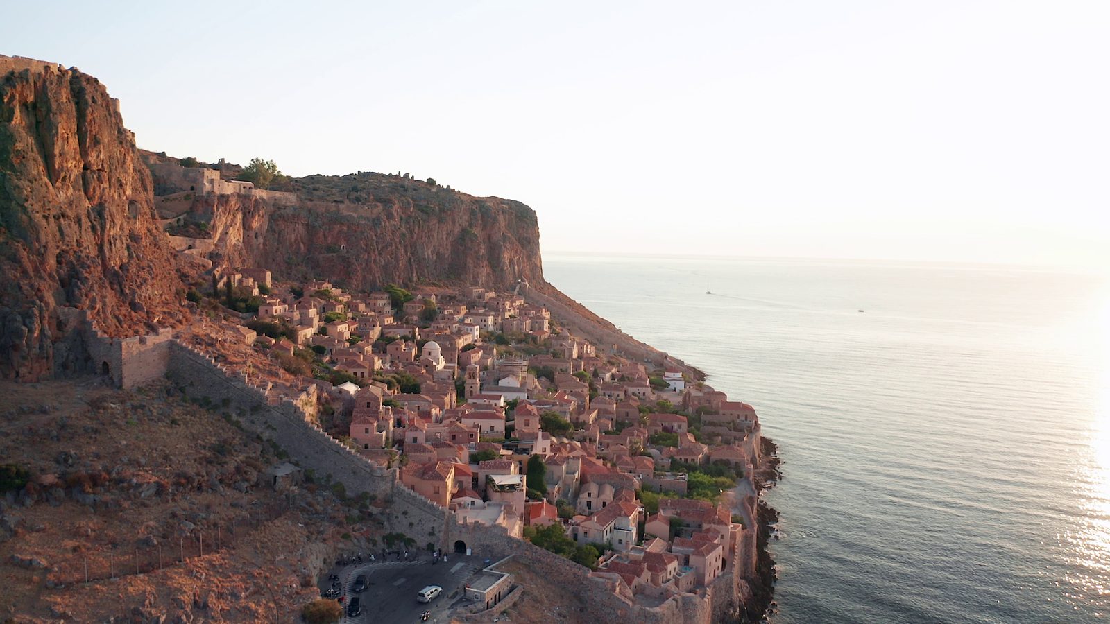 The medieval rock town of Monemvasia above the sea at sunrise