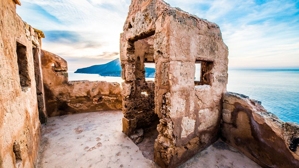 Ruined stone rooms looking out to the sea