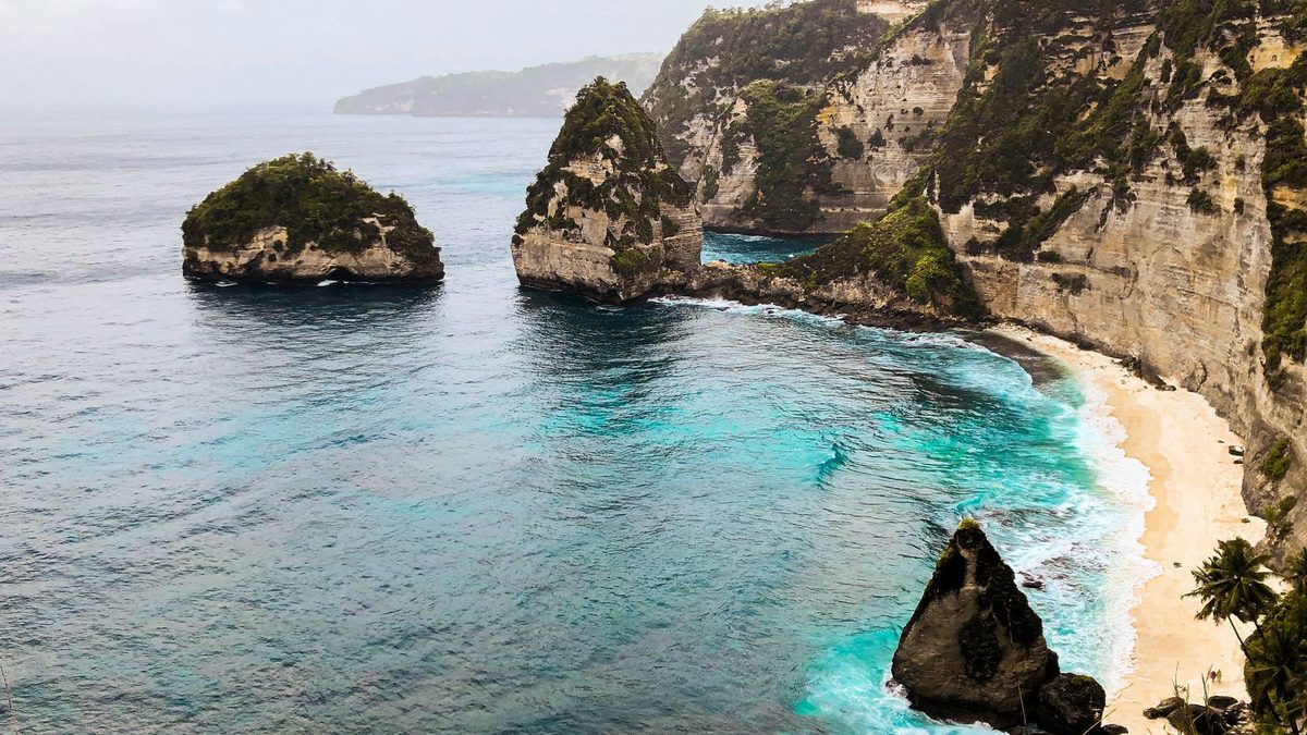 Coastal cliffs in hazy late-afternoon light