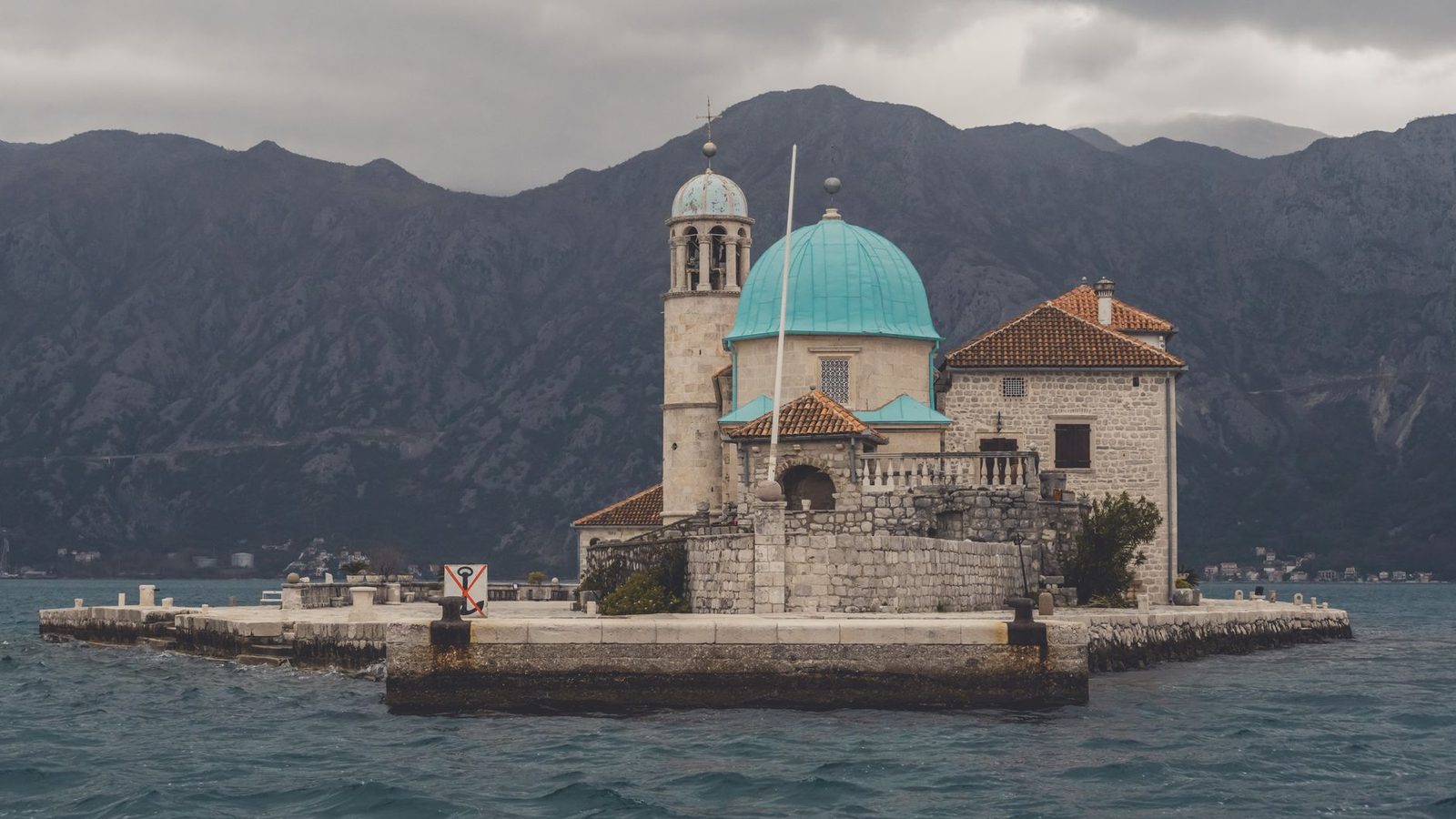 The church with a blue dome on the island of Our Lady of the Rocks