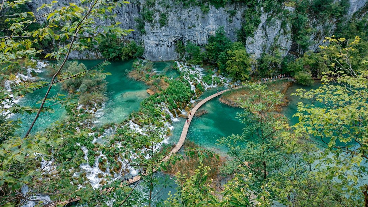 Early morning light on a quiet boardwalk at Plitvice Lakes