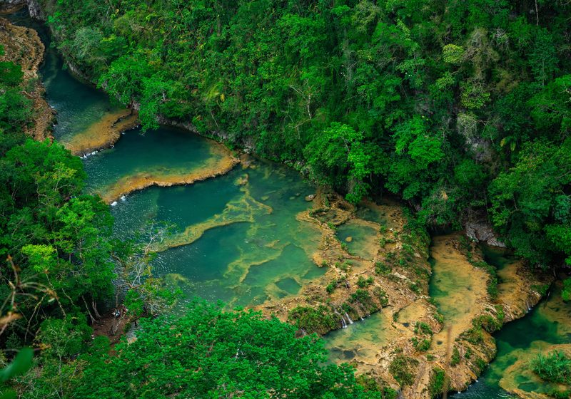 Stepped turquoise pools seen from above