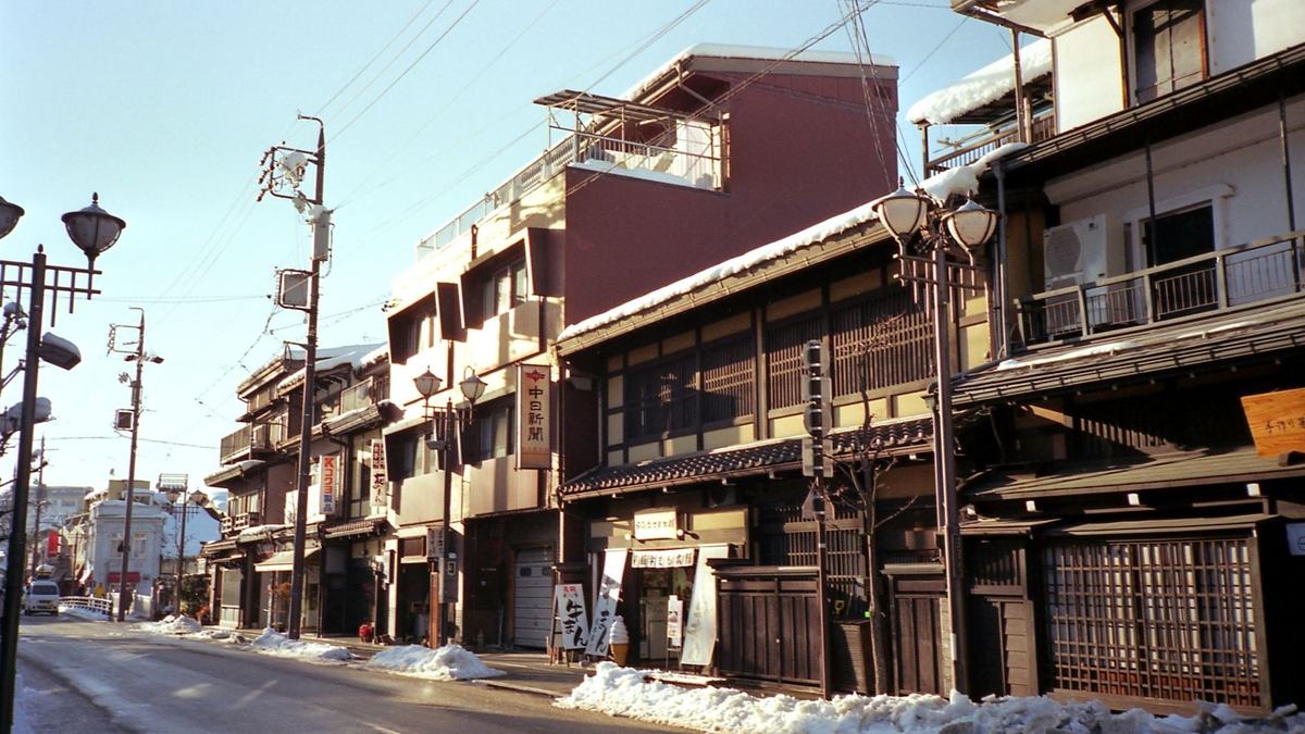 Traditional wooden houses on a street in Takayama's old town